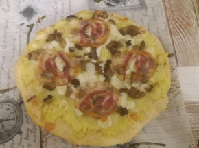 Pizza pancetta funghi patate