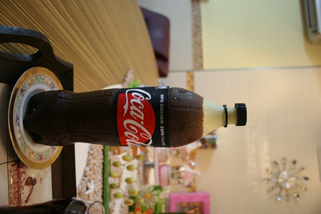immagine post Bottiglia di Coca-Cola dolce