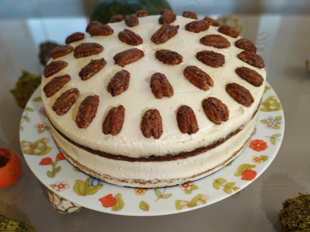 Pumpkin spice cake with maple cream cheese and crunchy candied pecans