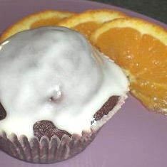 Muffin al cioccolato glassati all'arancia
